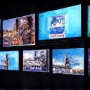 Multiple screens showing broadcast and streaming platforms.